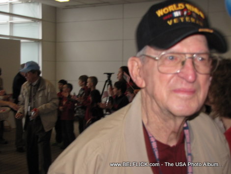 A real live World War II veteran greeting passengers at Washington Dulles Airport