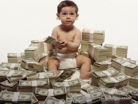 Money Baby Sitting On A Pile Of Cash